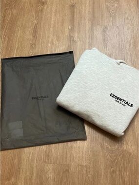 New Essentials hoodie with tags and dust bag